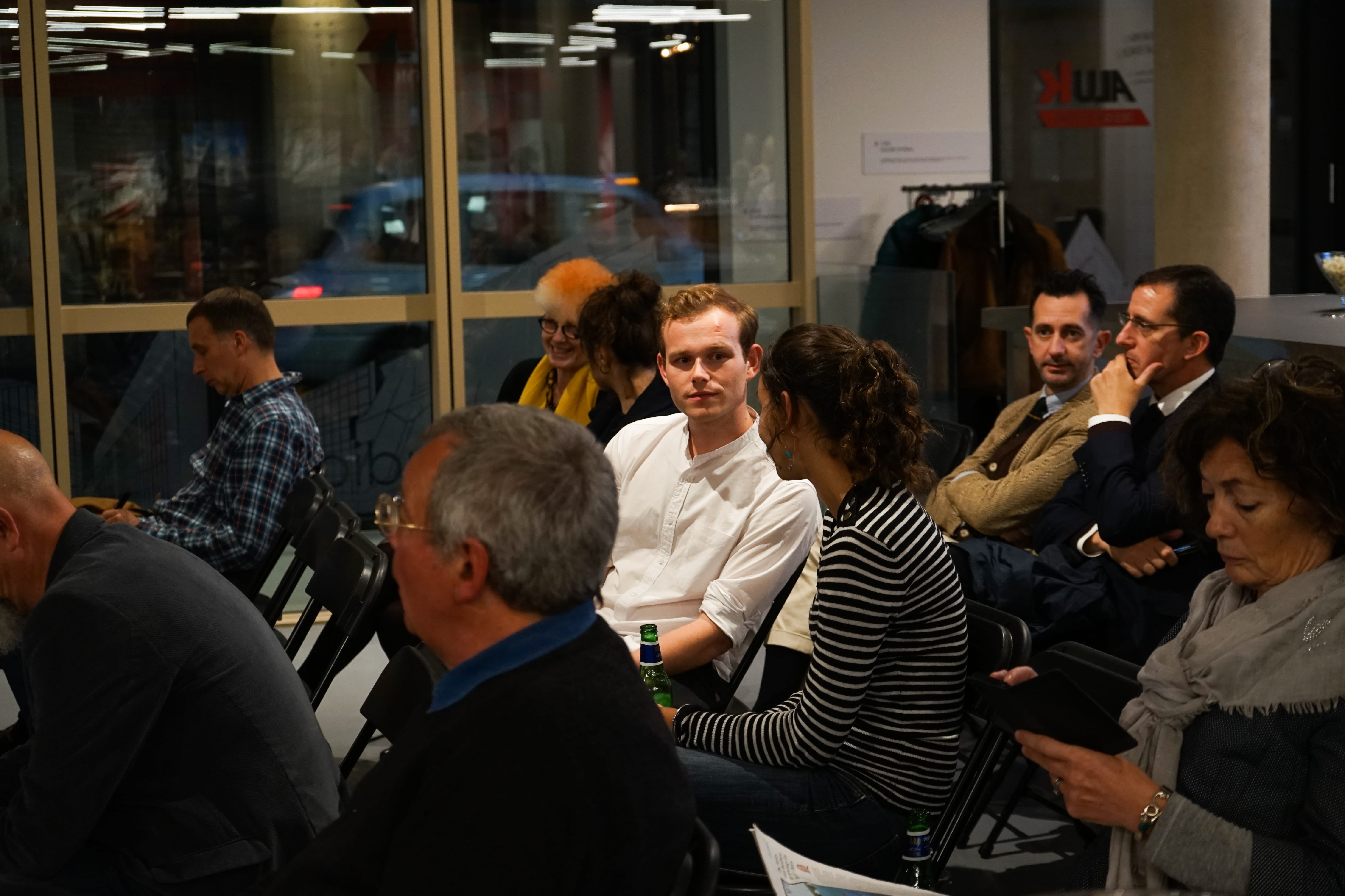 Guests listening to the speakers at the AluK and Architecture Today Event