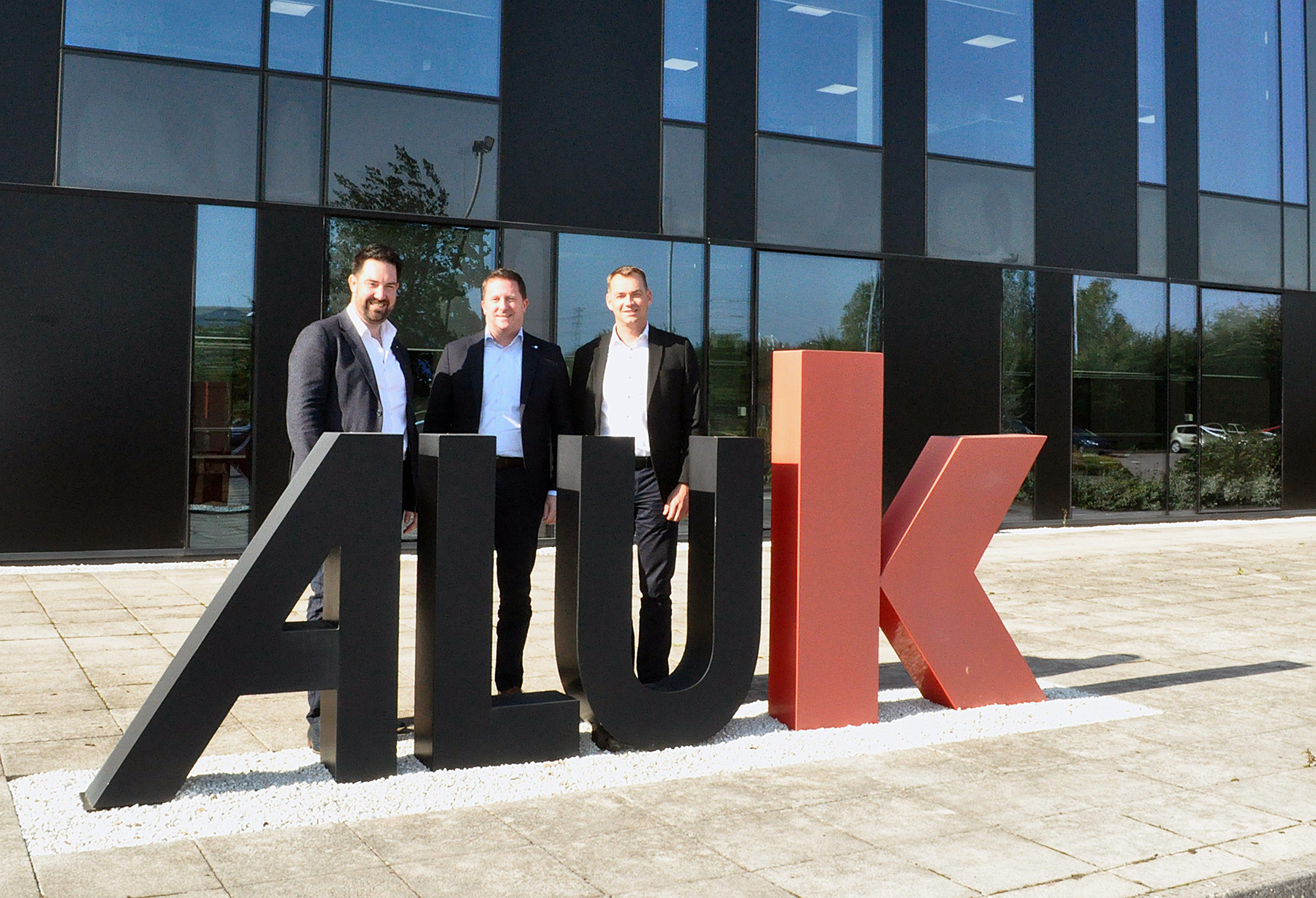 Russell Yates and Steven Helsen welcoming David Forde to AluK. 