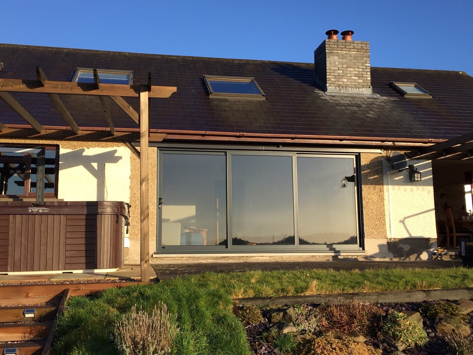 Sliding Door featuring in a home's back garden 